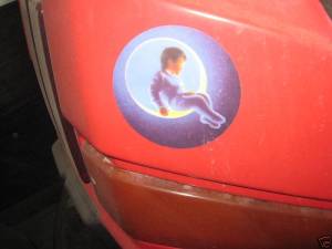 Michael Jackson's logo of little boy sitting on the moon is emblazoned on the bumper cars