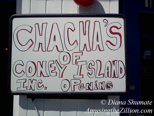 Chalkboard sign for Cha Cha's of Coney Island. New Location is 1315 Surf Avenue, the former Surf N Turf Grill. April 7, 2012. 2012. Photo © Diana Shumate Cha Cha's of Coney Island